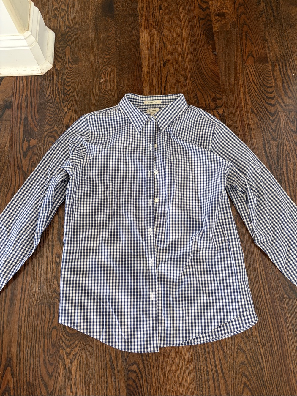 100% cotton L.L. Bean wrinkle free pinpoint Oxford shirt. Blue/white gingham L